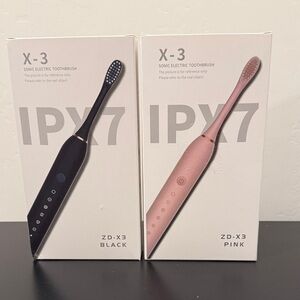 ZD-X3 Sonic Electric Toothbrushes.  Set of 2, one Black and one Pink New